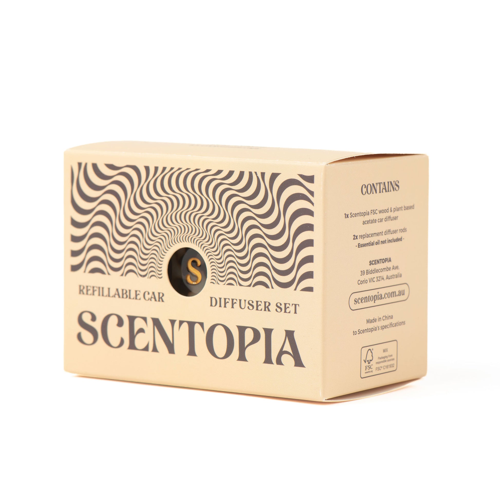 A beige cardboard box for a Scentopia refillable car diffuser set, featuring a black wavy pattern and product text, photographed on a clean white background.