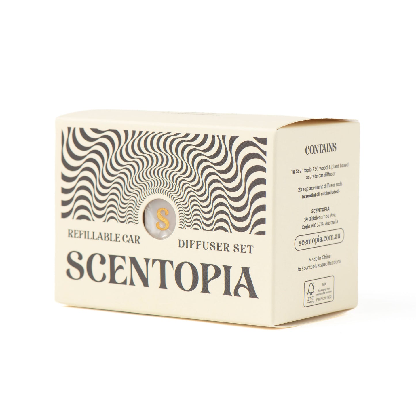 A cream-colored cardboard box for a Scentopia refillable car diffuser set, featuring a black wavy optical illusion pattern on the front and product text, photographed on a white background.