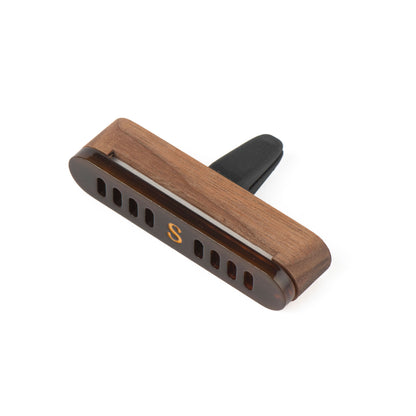 A Scentopia  espresso coloured walnut wood and acetate car diffuser, shown on a plain white background.