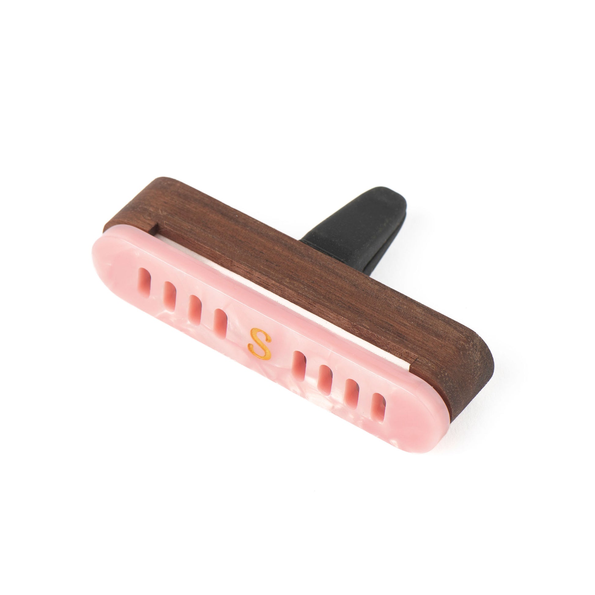 Scentopia petal pink acetate car diffuser cover with a gold 'S' logo and a dark brown walnut wood case, shown on a plain white background.