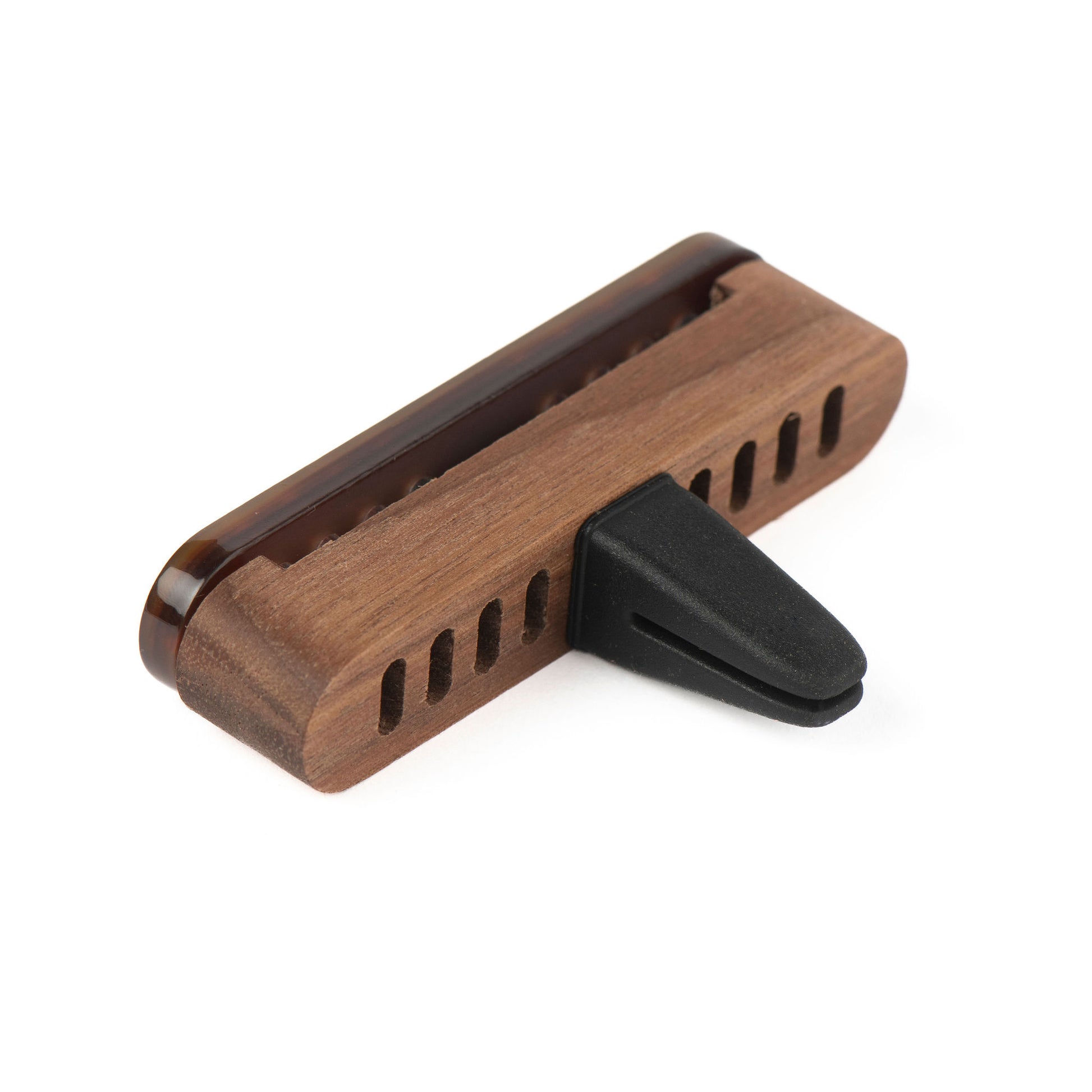 A Scentopia  espresso coloured walnut wood and acetate car diffuser with a black silicon clip, shown on a plain white background.