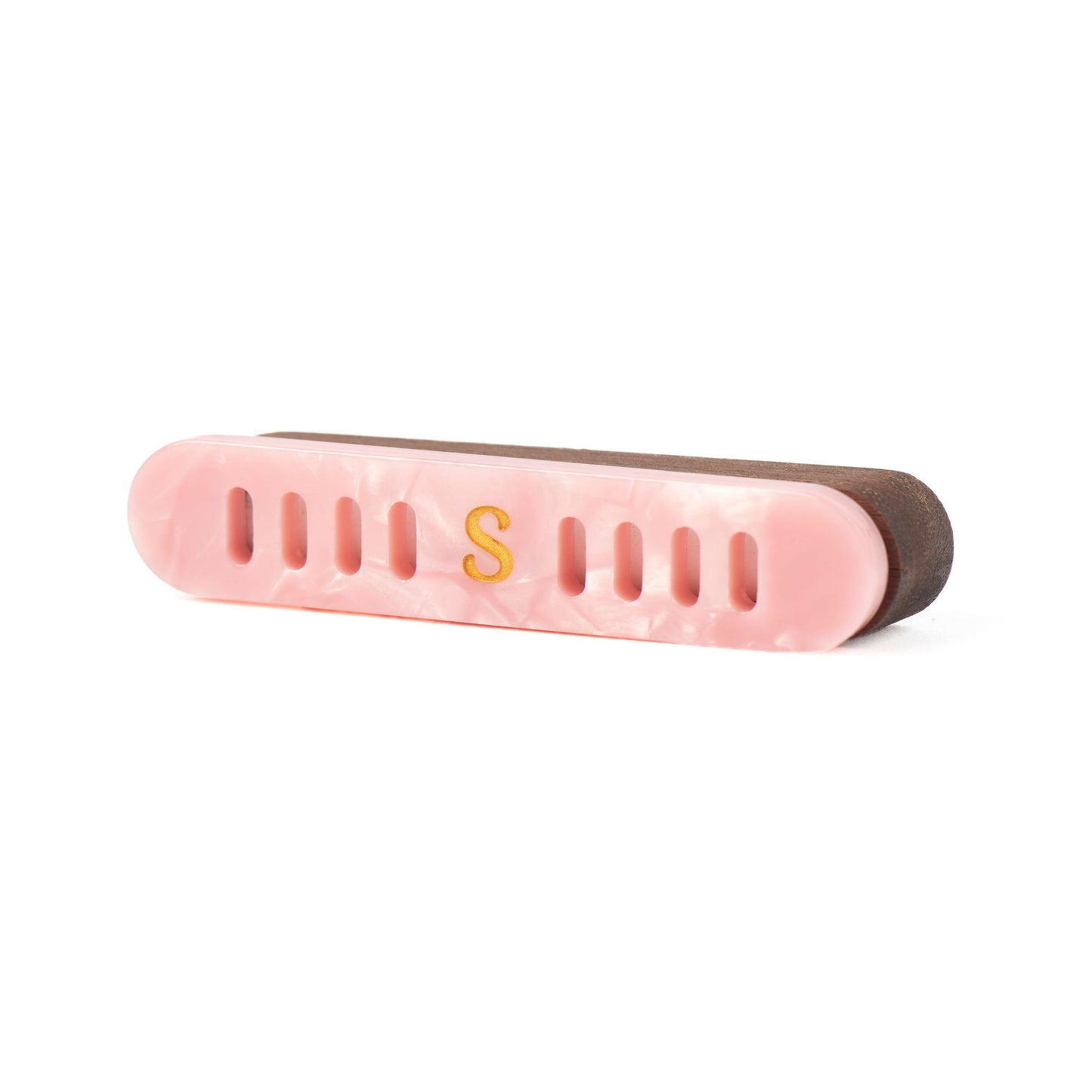 Scentopia petal pink tortoiseshell-style car diffuser cover with a gold 'S' logo and a dark brown walnut wood case, shown on a plain white background.