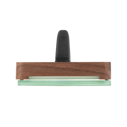 A light jade green car diffuser with a walnut wood case , shown on a plain white background.