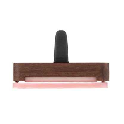 Top view of Scentopia petal pink acetate car diffuser cover with a gold 'S' logo and a dark brown walnut wood case, shown on a plain white background.