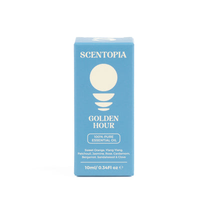 A 10ml box of Scentopia Golden Hour essential oil, featuring a light blue packaging box with cream-colored text and graphics on a white background.