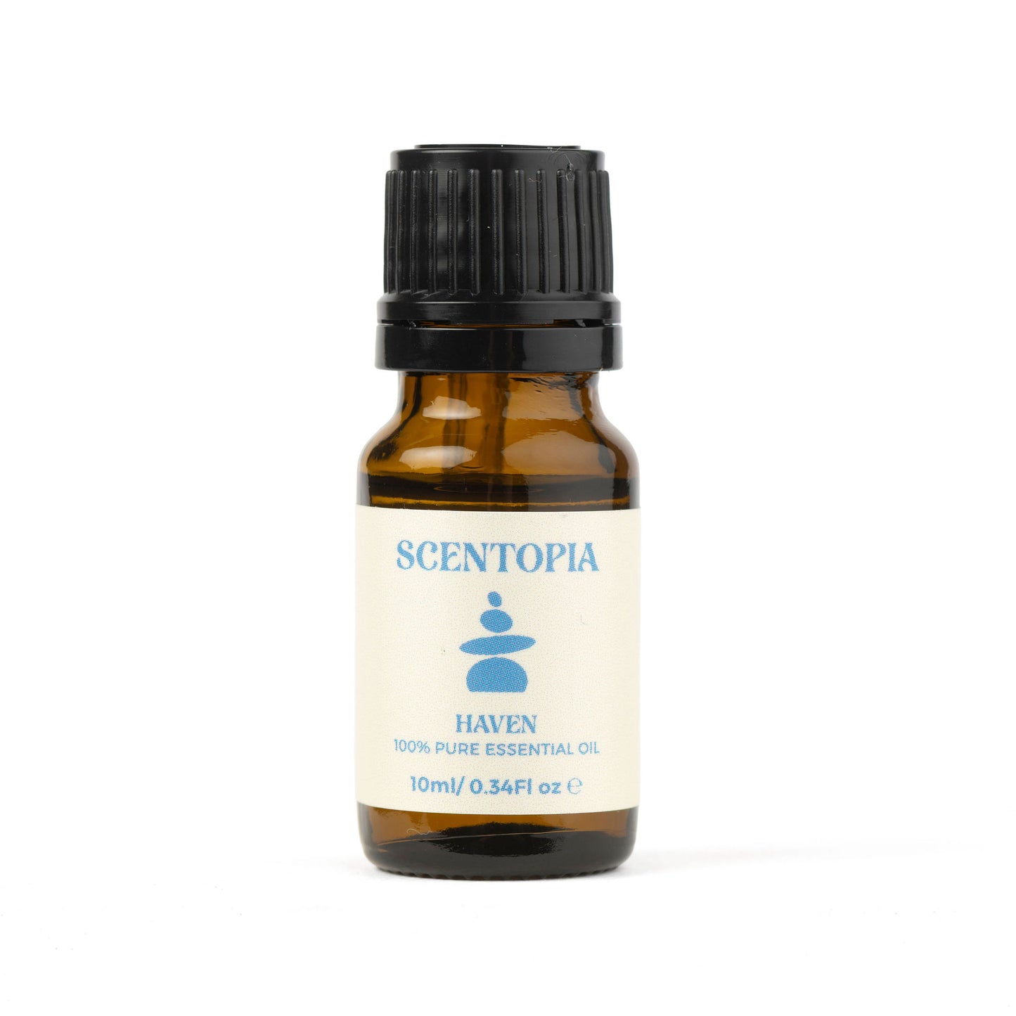 A 10ml amber glass bottle of Scentopia Haven essential oil with a black ribbed cap and a cream-colored label, set against a plain white background.
